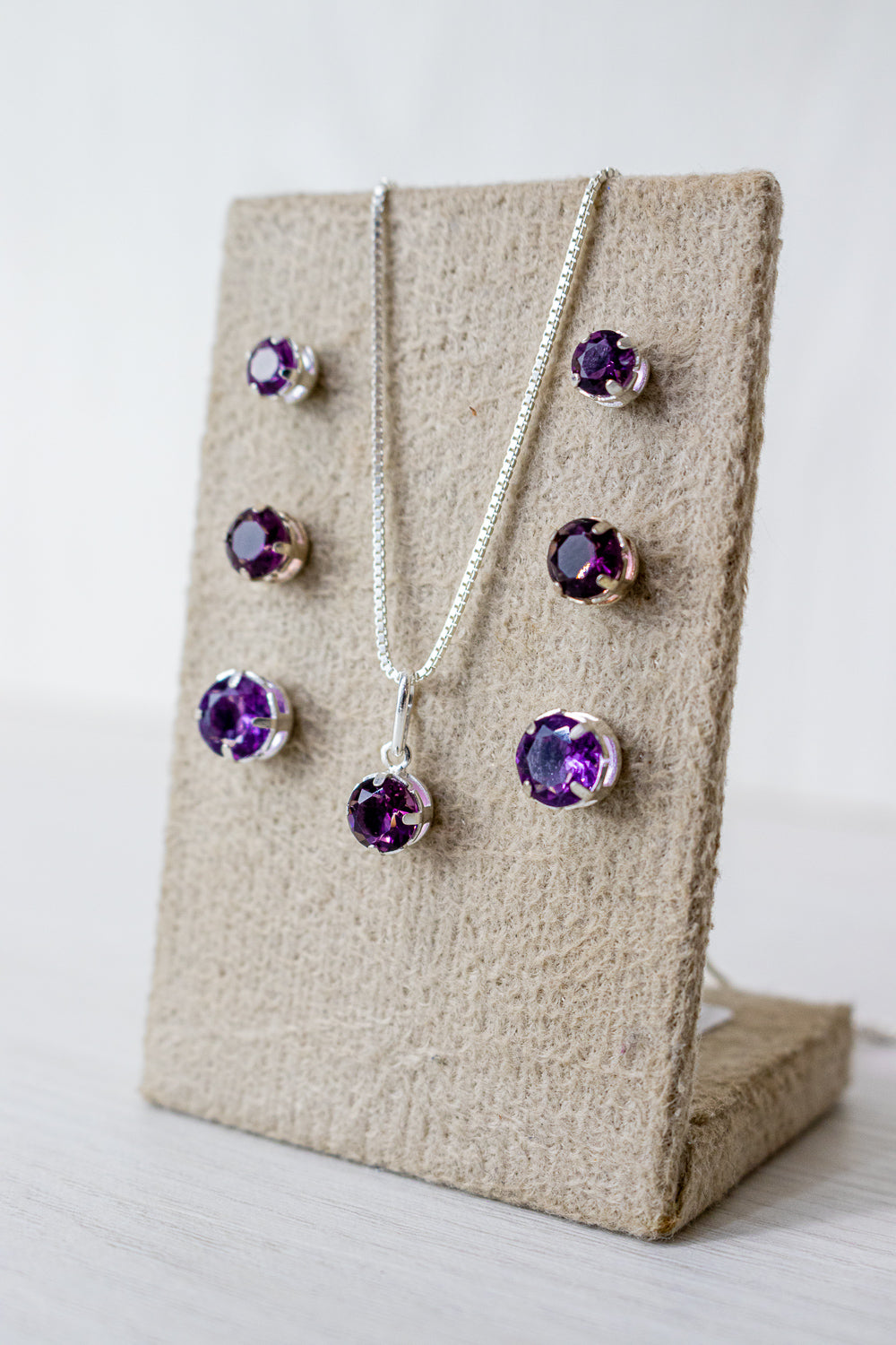 BRINCO PONTO DE LUZ AMETISTA EM PRATA 925