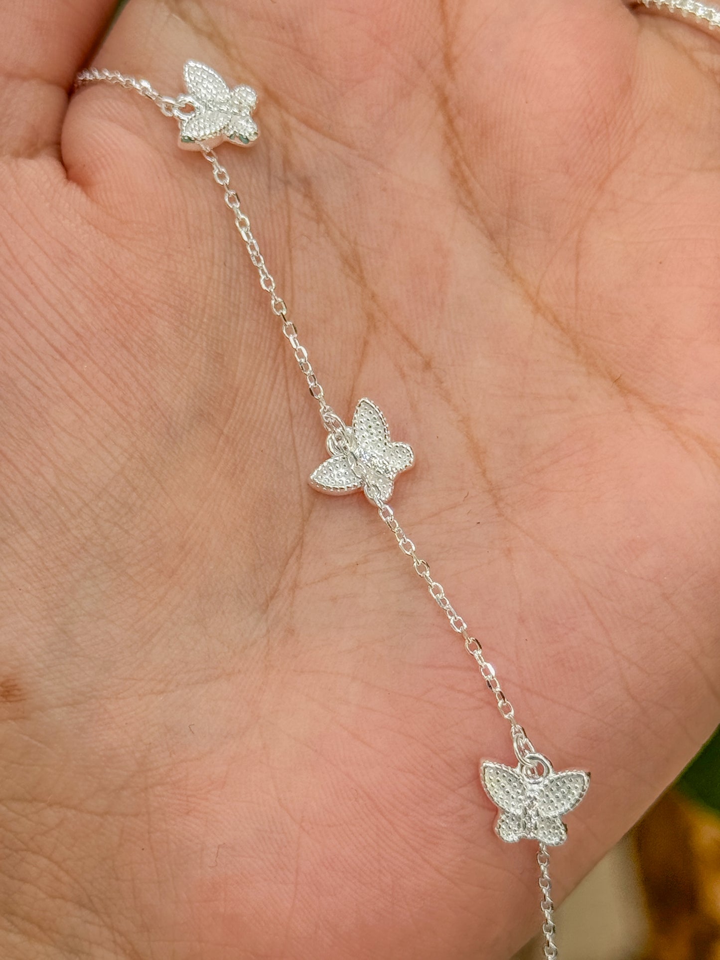 PULSEIRA 3 BORBOLETAS CRAVEJADAS